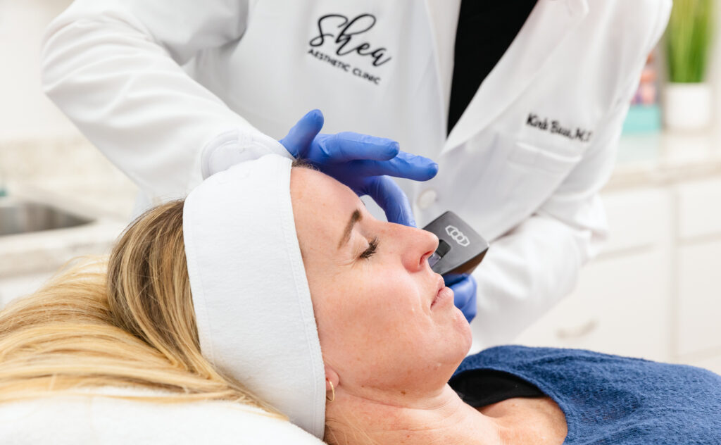 A patient lies down for a Morpheus8 treatment after completing Ellacor near Oak Ridge.