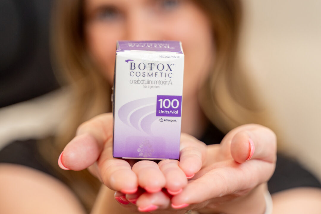 A PA at Shea Aesthetic Clinic holds a box of Botox near Hardin Valley.