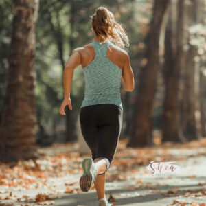 A young woman engaged in running a great cardio exercise that can help get rid of visceral fat